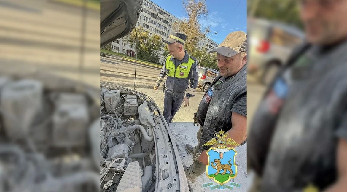 В Пскове экипаж ДПС помог потушить загоревшийся в дорожном заторе автомобиль В Пскове экипаж ДПС помог потушить загоревшийся в дорожном заторе автомобиль